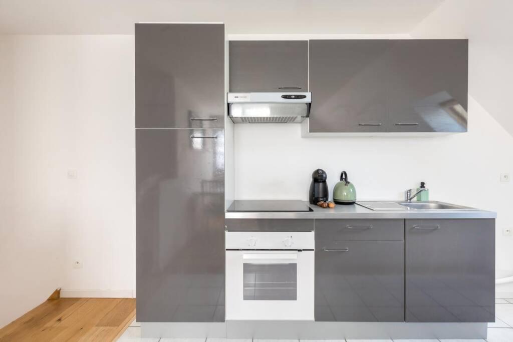 Grand Confort, Appartement Osny Экстерьер фото
